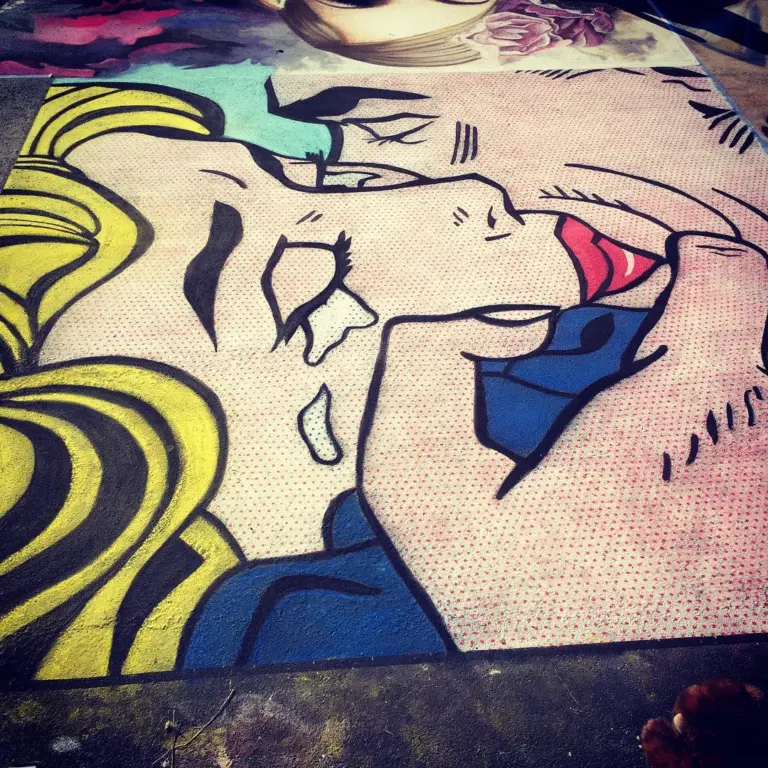 Pop-art chalk drawing of a couple about to kiss, drawn with heavy black lines, flowing yellow hair and dotted skin.